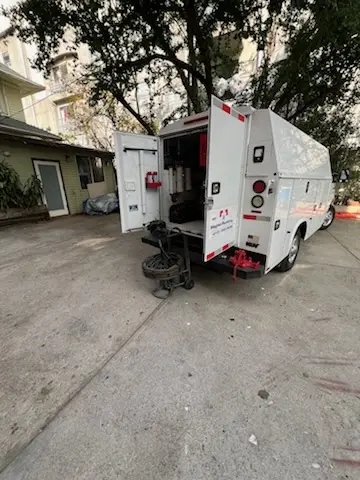 Magnet Plumbing service vehicle on-site for Grease Trap Cleaning in Plantation Resort